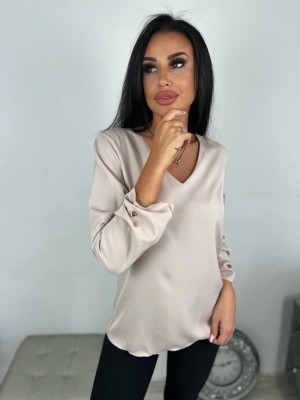 Bluzka z guzikami na rękawie