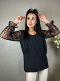 Elegancka bluzka z ozdobnym rękawem