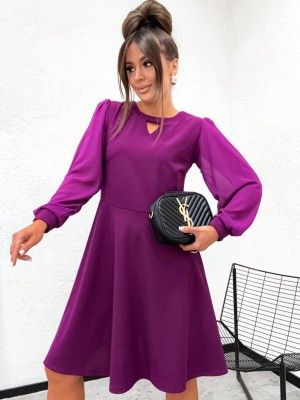 Rozkloszowana sukienka z siateczkowym rękawem